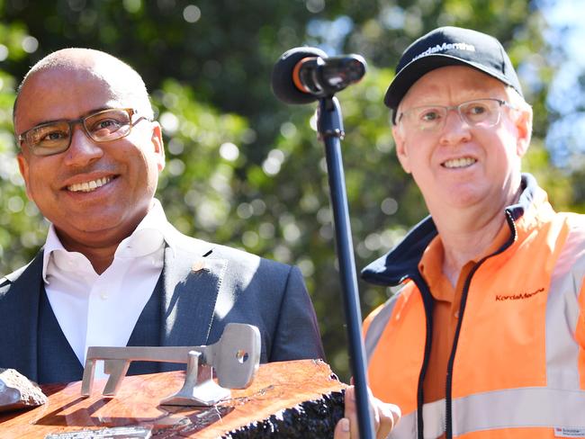 GFG Alliance executive chairman Sanjeev Gupta (with Mark Mentha, right) holds the keys to his new business at an event marking the official handover of Arrium's steel and mining operations across Australia to the GFG Alliance at the Whyalla steelworks in Whyalla, South Australia, Friday, September, 1, 2017. (AAP Image/David Mariuz) NO ARCHIVING