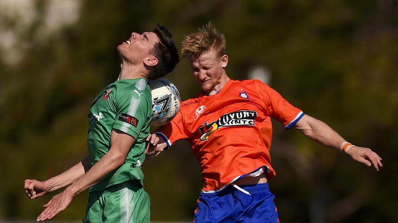 Joel Allwright of Campbelltown City and Shaun Carlos of Lions FC compete for the ball during a 2019 National NPL match between Lions FC and Campbelltown City. Picture: Getty Images