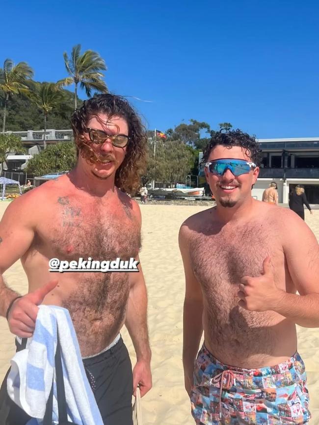 Adam Hyde taking photos with beachgoers. Photo: Supplied.