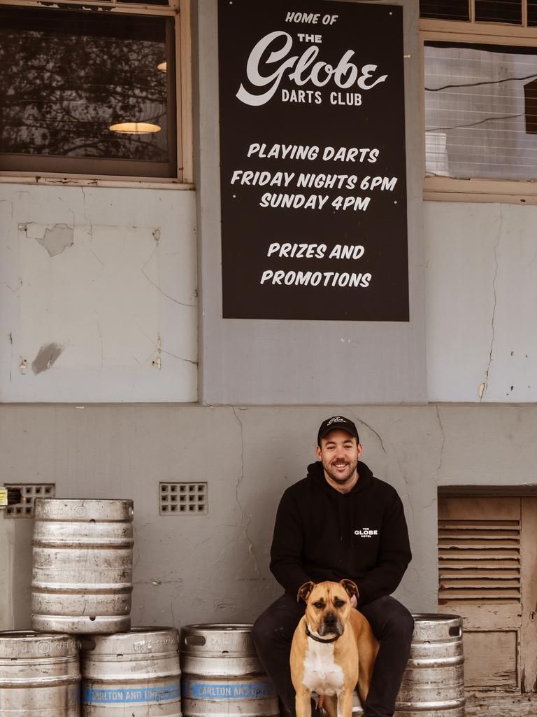 Publican Paul Flynn, who owns the Globe Hotel in Rylstone, NSW, with his dog Boots. Picture: TPH Rural Marketing