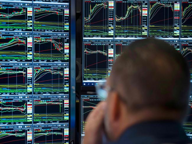 Traders work the floor of the New York Stock Exchange on August 16, 2024. US stocks edged lower in early trading Friday, as traders looked to lock in gains at the end of a positive week for major Wall Street indices. Around 10 minutes into trading, the Dow Jones Industrial Average was down 0.1 percent at 40,518.87, and the S&P was 0.1 percent lower at 5,536.08. The Nasdaq slipped 0.2 percent to 17,566.08. (Photo by ANGELA WEISS / AFP)