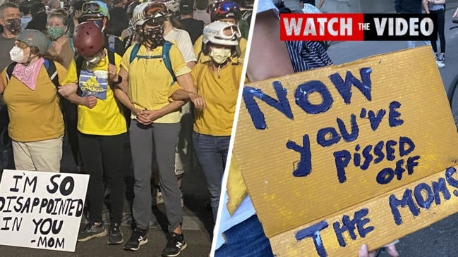 'Wall of Mums' face off against Trump's 'secret police' in Portland