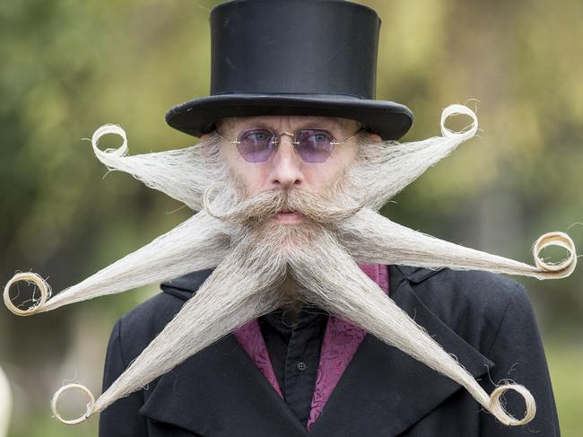 LEOGANG, AUSTRIA - OCTOBER 3: A contestant of the World Beard And Mustache Championships poses for a picture during the opening ceremony of the Championships 2015 on October 3, 2015 in Leogang, Austria. Over 300 contestants in teams from across the globe have come to compete in sixteen different categories in three groups: mustache, partial beard and full beard. The event takes place every few years at different locations worldwide. (Photo by Jan Hetfleisch/Getty Images)