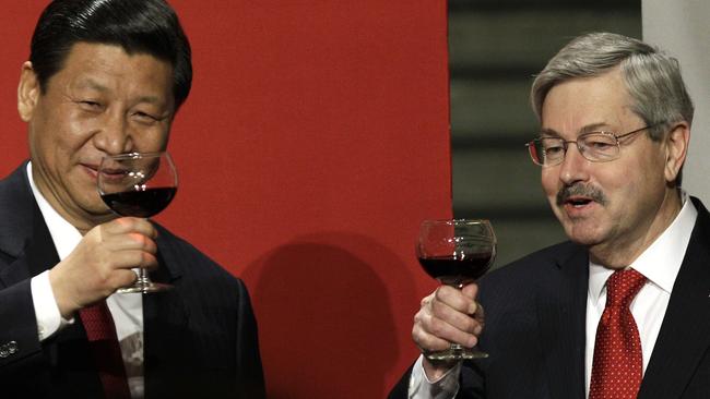 Chinese President Xi Jinping and US ambassador Terry Branstad in happier times. Picture: AP Photo/Charlie Neibergall