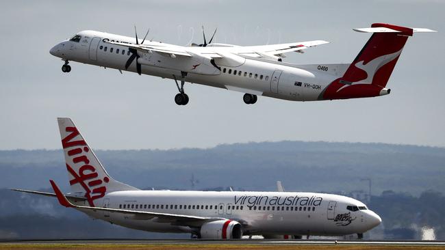 Qantas is being taken to court by the nation’s competition watchdog for advertising tickets for more than 8,000 flights that it had already cancelled. Picture: David Gray/AFP