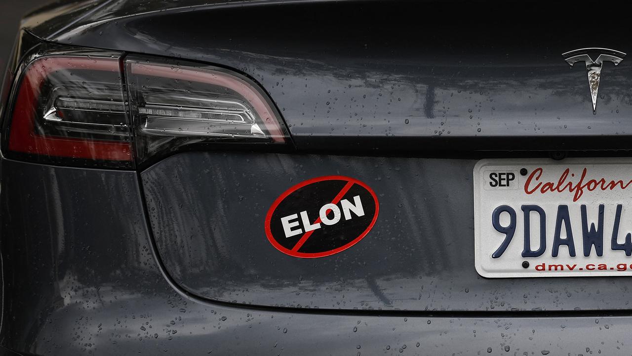 <!DOCTYPE html PUBLIC "-//W3C//DTD HTML 4.0 Transitional//EN" "http://www.w3.org/TR/REC-html40/loose.dtd"><html><body><p>A Tesla in California was seen with an anti Elon Musk bumper sticker. Picture: Justin Sullivan/Getty Images via AFP</p></body></html>