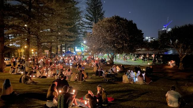 Hundreds gathered at Burleigh Heads for a candlelight vigil for Cameron Duce.