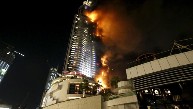 A cladding fire engulfs The Address Hotel in downtown Dubai in the UAE on December 31, 2015. Picture: Reuters/Ahmed Jadallah