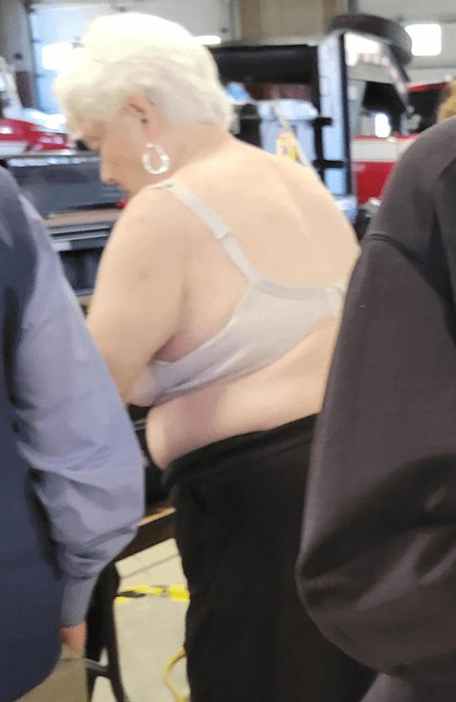 A New Jersey woman was photographed at a Hamilton Township polling site in her bra after she was reportedly asked to remove her pro-Trump shirt and MAGA hat. Picture: Reddit