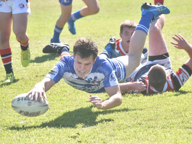 Sean Bourke scores a try for Ignatius Park against St Patrick's College in the Aaron Payne Cup in Mackay, 20 July 2021. Picture: Matthew Forrest