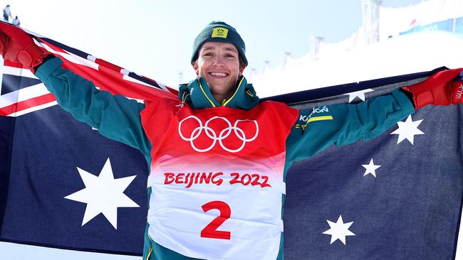 Scotty James poses during the medal ceremony.