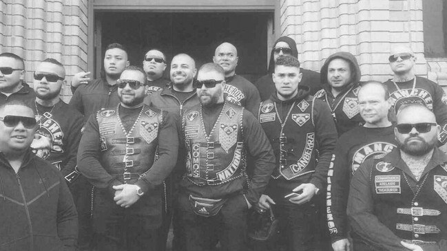 Pitasoni Ulavalu (centre rear) pictured with other senior Australian gang office holders, was stabbed and killed at Kokomo's nightclub in Canberra