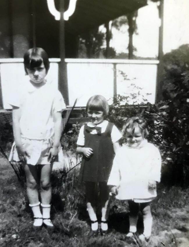 Mrs Hughes (centre) with sisters Dawn (left) and Colleen when they were children.