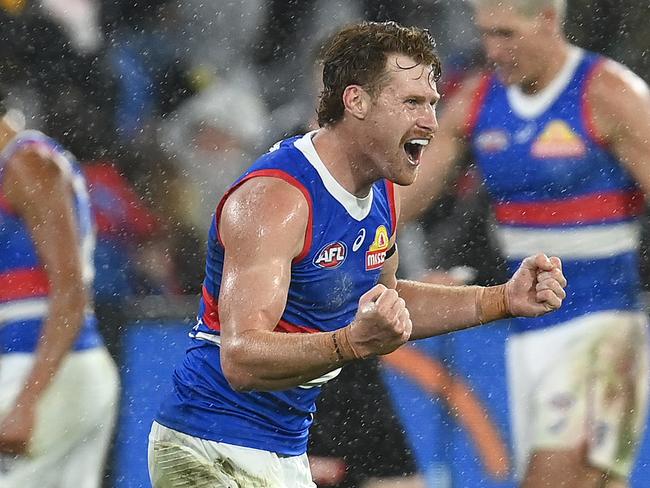 MELBOURNE, AUSTRALIA - APRIL 08: Oskar Baker of the Bulldogs celebrates winning the round four AFL match between Richmond Tigers and Western Bulldogs at Melbourne Cricket Ground, on April 08, 2023, in Melbourne, Australia. (Photo by Quinn Rooney/Getty Images)