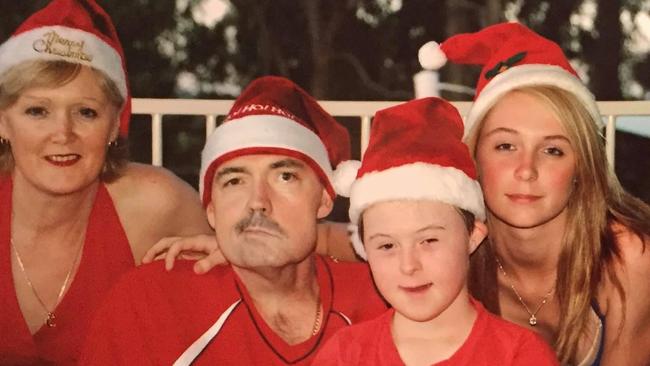 Gaven MP Meaghan Scanlon shared a family photo of her mother Margaret, her father and former Gold Coast police officer Phil, and her younger brother Callum during Phil’s cancer battle. Photo: Facebook