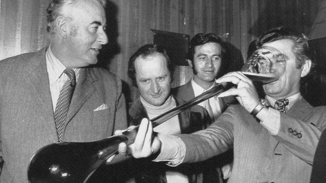 Bob Hawke downs a yard glass of beer.