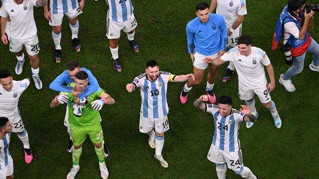 Argentina players celebrate with fans after the match. Picture: AFP Images