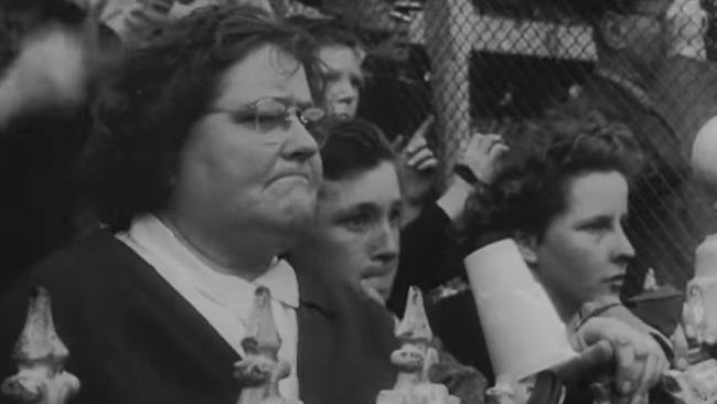 Disgruntled Bombers fans show their pain after the final siren. Picture: National Film and Sound Archive