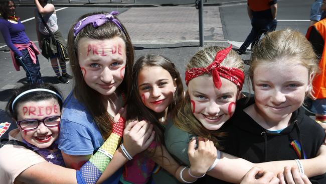 The Pride Parade from North Hobart to Parliament Lawns. in Hobart,, Campbell st primary girls who are leading the parade with the banner, from left, Ruby Harrison-Buzzacott Maggie Staines, Kiora Hogan, Ada Harrison-Burnett and Meiren Swift,