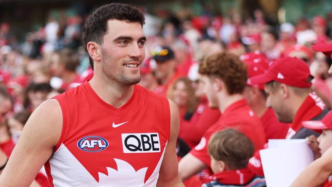 SYDNEY, AUSTRALIA - APRIL 21:  Tom McCartin of the Swans celebrates victory with fans after the round six AFL match between Sydney Swans and Gold Coast Suns at SCG, on April 21, 2024, in Sydney, Australia. (Photo by Matt King/AFL Photos/via Getty Images )