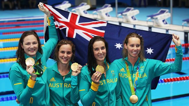 Australia's Cate Campbell, Bronte Campbell, Brittany Elmslie, Emma McKeon Gold Medal winning 4 x 100m relay team on Day 1 of the Swimming at the Rio 2016 Olympic Games. Picture. Phil Hillyard