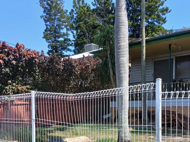 Ute smashes fence, hits telephone pole