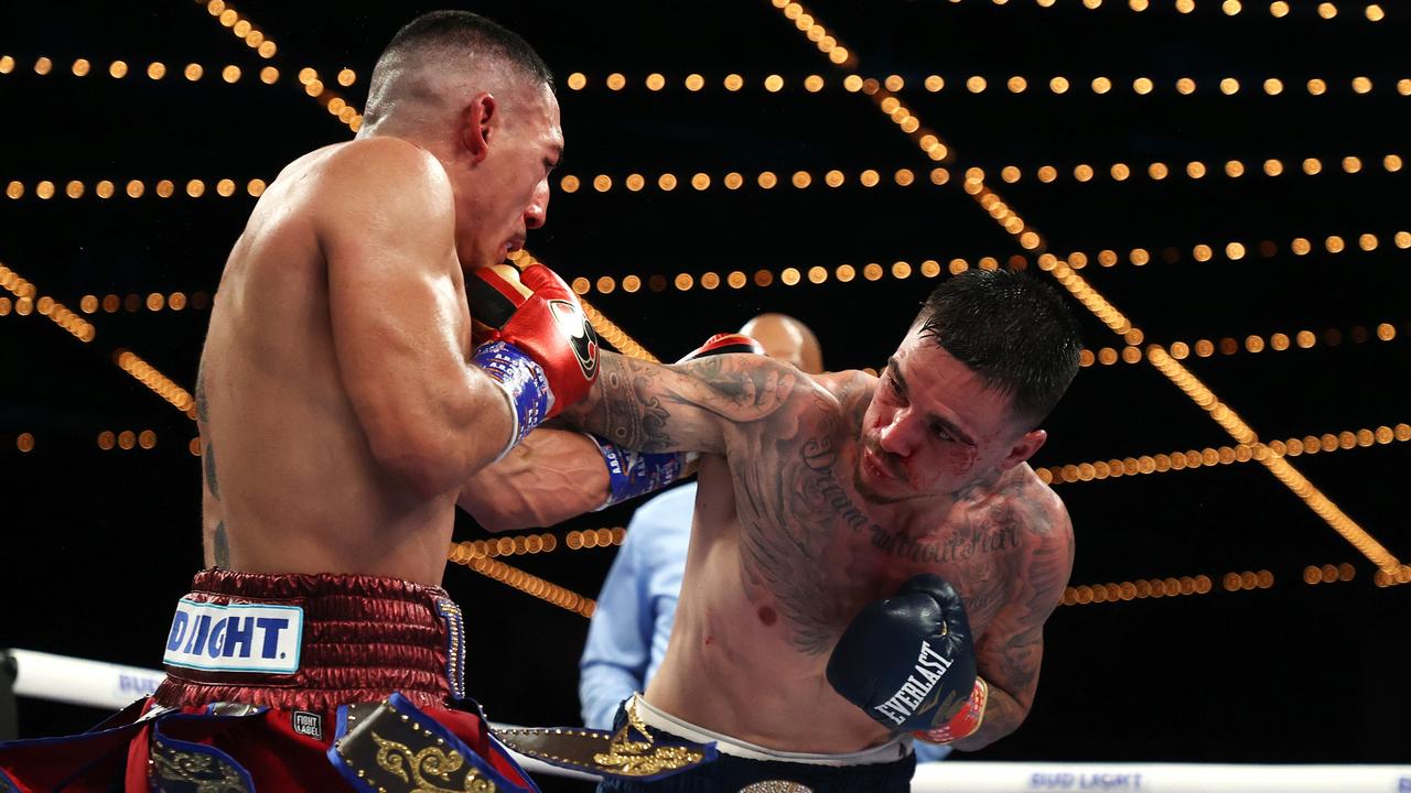 George Kambosos lands another telling blow to Teofimo Lopez during their championship bout at Madison Square Garden.