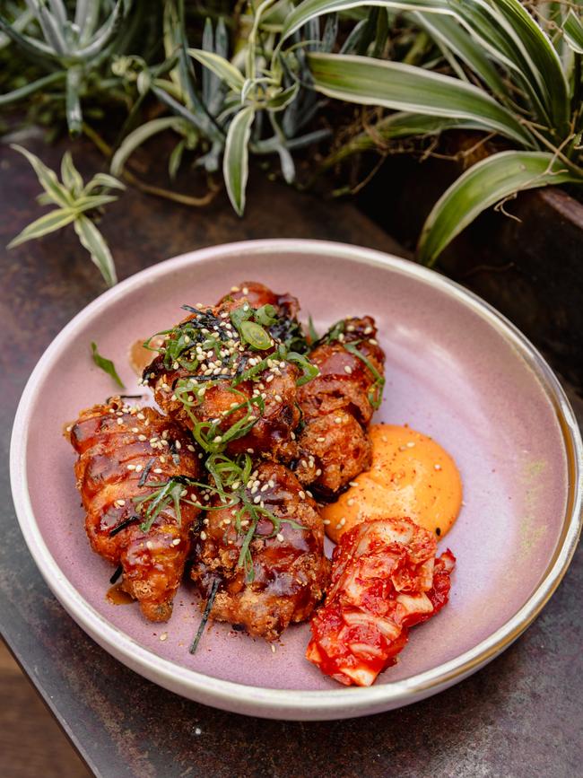 Anju's Sweet Corn Kimchi Fritters dish features delicious, light and fluffy sweet corn kimchi fritters, teriyaki and Kewpie mayonnaise. Picture: Dearna Bond/DarkLab