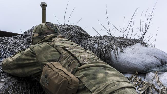 Ukrainian soldiers, view the positions of Russian-led forces in Zolote, Ukraine. Picture: Getty Images.