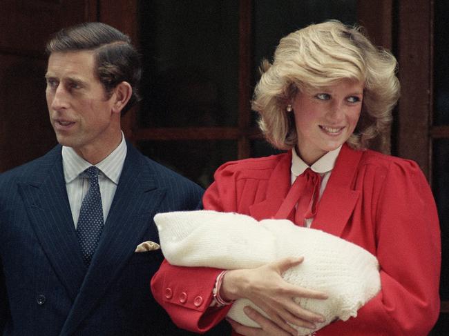 Prince Charles and Princess Diana with baby Harry, who was named Henry. Picture: AP 