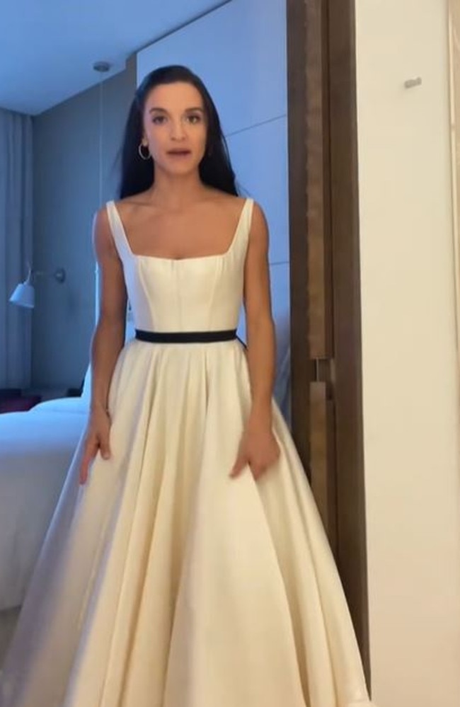 Mrs Domanico wore her wedding dress to her twin's big day. Picture: TikTok