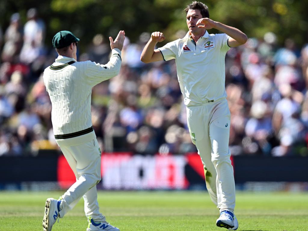 The Australian captain, right, after dismissing Rachin Ravindra of New Zealand during day three of the Second Testbetween New Zealand and Australia in New Zealand. Picture: Getty Images