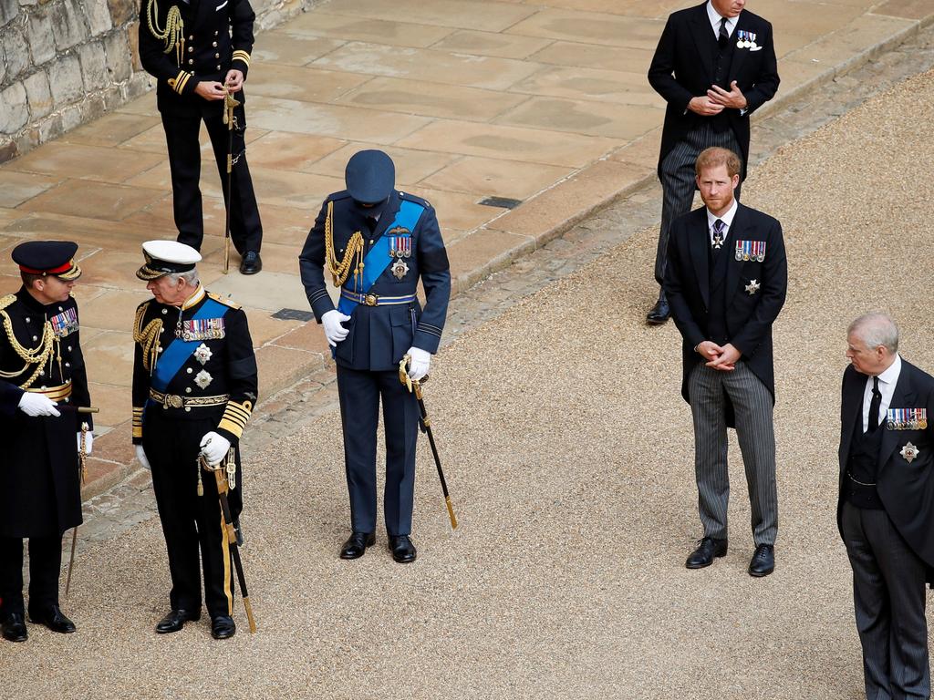 William and Harry were seen standing idle at they awaited the Queen’s procession at Windsor Castle. Picture: Peter Nicholls – WPA Pool/Getty Images