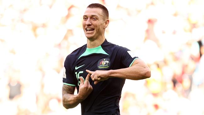 Mitchell Duke of Australia celebrates after scoring their team's first goal during the FIFA World Cup Qatar 2022 Group D match between Tunisia and Australia (Photo by Robert Cianflone/Getty Images)