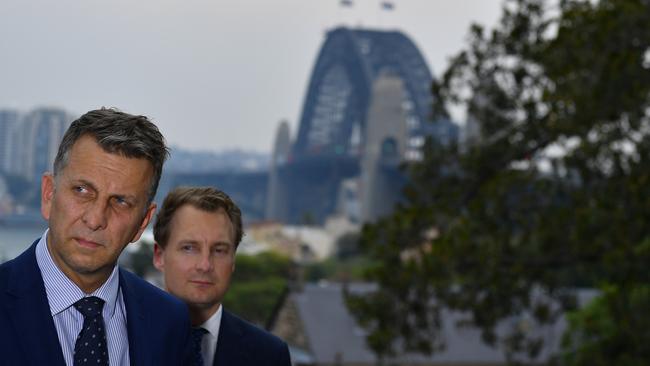 Andrew Constance (left) has promised drastically reduced travel times as a result.