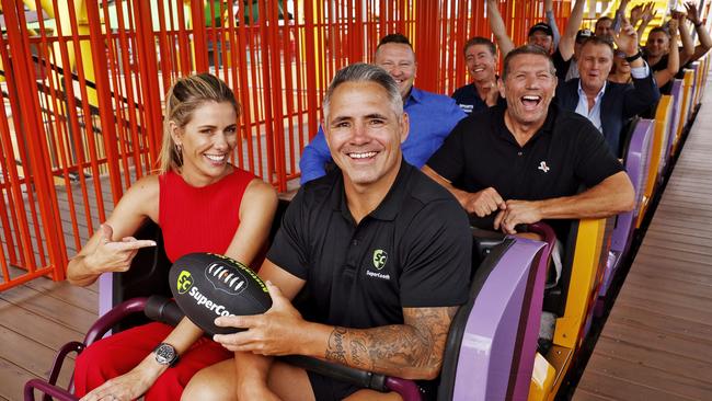 DAILY TELEGRAPH - 18.2.25Super Coach shoot at Luna Park today. Lara Pitt and Corey Parker in front carriage. Picture: Sam Ruttyn