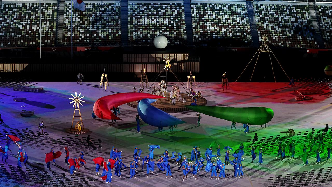 Entertainers perform during the opening ceremony of the Tokyo 2020 Paralympic Games at the Olympic Stadium.