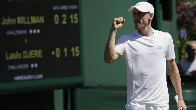 Australia's John Millman reacts after winning a point against Serbia's Laslo Djere. Picture: AP