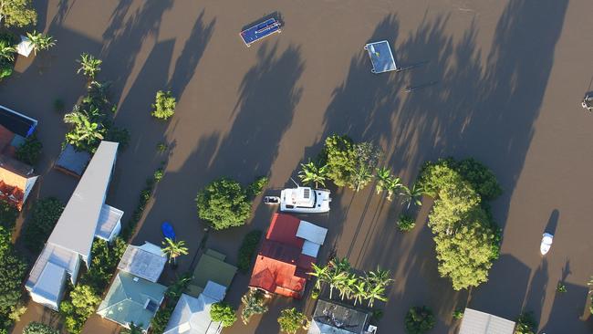 An aerial view of a flooded suburban area adjacent to the Brisbane River on January 13, 2011 in Brisbane, Australia.