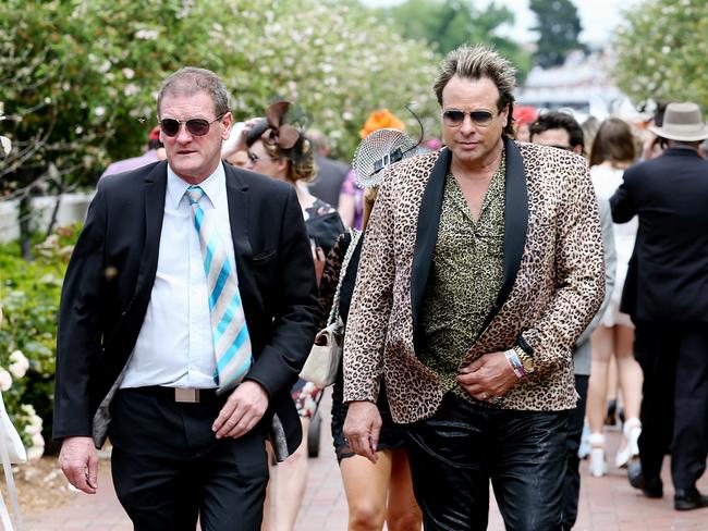 Ricky Nixon and Warrick Capper arrive in the Birdcage at the 2014 Melbourne Cup. Picture: Tim Carrafa