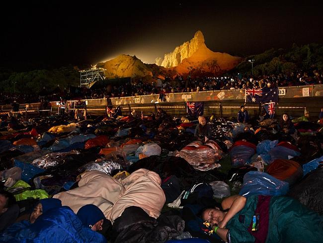 Pre dawn ... Australians and New Zealanders sleep ahead of the Anzac Day dawn service at Anzac Cove in Gallipoli. Picture: Ella Pellegrini