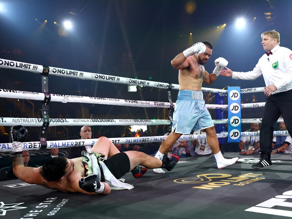 Isaac Liki crashes to the canvas after a big shot from Liam Taliva’a. Picture: Getty Images