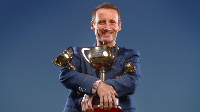 Champion jockey Damien Oliver has won three Melbourne Cups, on Doriemus in 1995, on Media Puzzle in 2002 and on Fiorente in 2014. Picture: Michael Klein