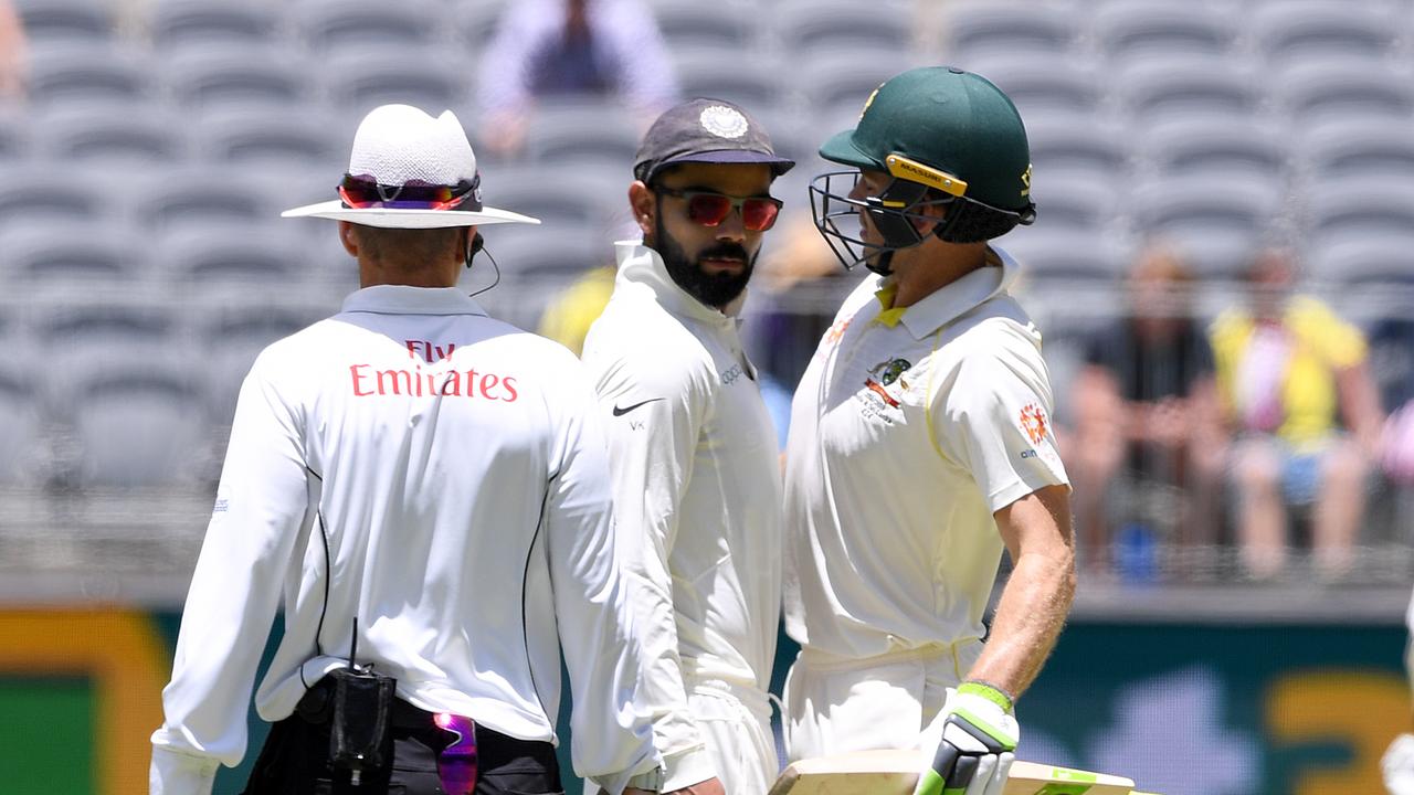 Indian captain Virat Kohli and Australian captain Tim Paine clash.