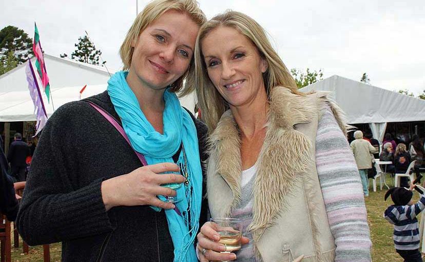 Debra Bywater and Stacey Bell sample wine at the Ergon Energy Flower, Food and Wine Festival, Queens Park. Picture: Peter Hackney