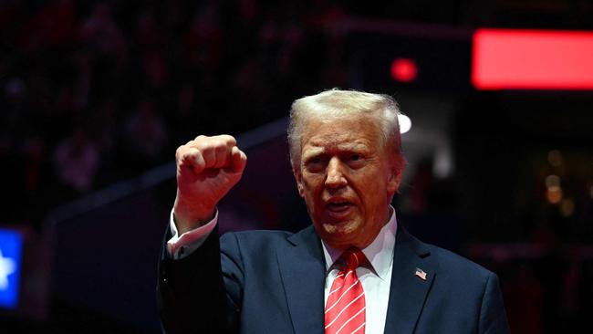 Donald Trump reacts during a MAGA victory rally at Capital One Arena in Washington, DC, on January 19, 2025, on the night before his inauguration ceremony. Picture: AFP