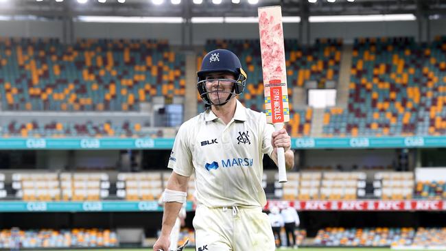 Seb Gotch of Victoria acknowledges the fans after scoring a century against Queensland at the Gabba. (Photo by Bradley Kanaris/Getty Images)