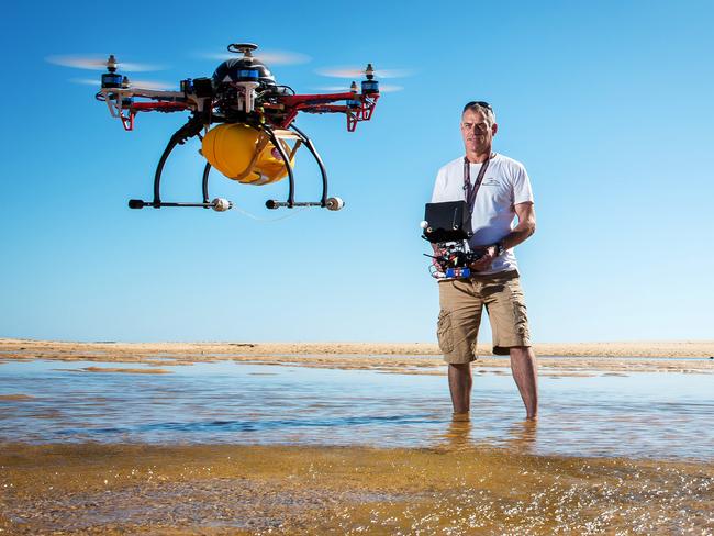Unmanned aircraft ... Victorian paramedic Robin Lowe has developed a prototype drone that he says could be used to revolutionise surf and rescue operations. The gadget can be launched and deploy flotation devices. Picture: Jake Nowakowski