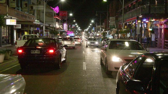 Cars head down Hindley St on a Friday night. Could it become a one-way street?