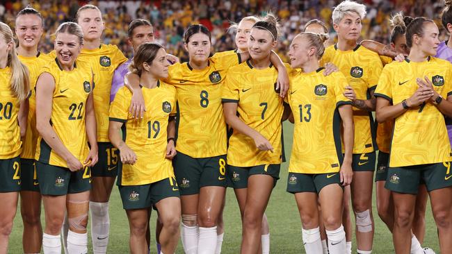 MELBOURNE, AUSTRALIA - FEBRUARY 28: The Matildas celebrate after securing their qualification for the Paris 2024 Olympics after winning the AFC Women's Olympic Football Tournament Paris 2024 Asian Qualifier Round 3 match between Australia Matildas and Uzbekistan at Marvel Stadium on February 28, 2024 in Melbourne, Australia. (Photo by Darrian Traynor/Getty Images)